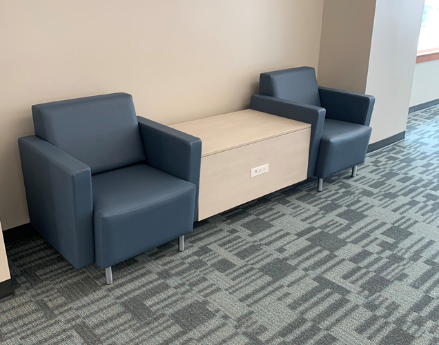 University lounge chairs with armrests and power table