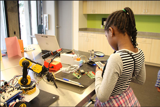 Orlando Public Library Child Building Robot