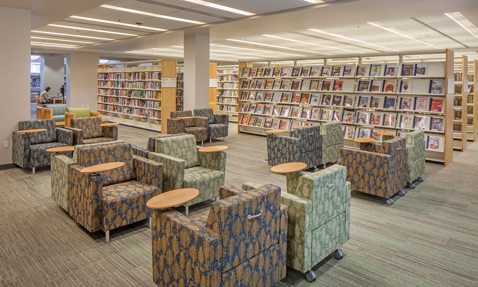 Library installation, Carlsbad City, lounge chairs with tablet tables connected
