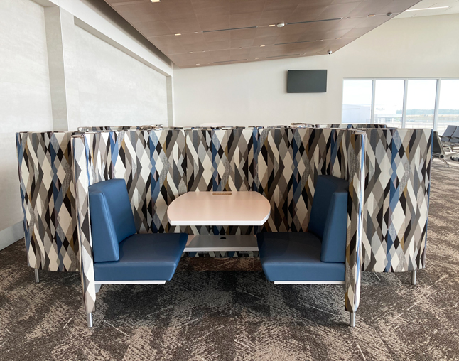 airport privacy pod seating and workstations in