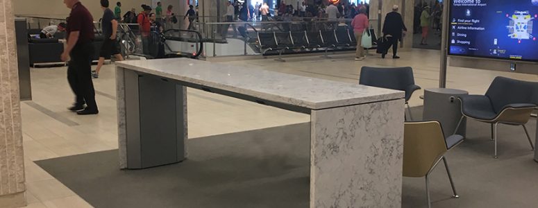 Airport Charging tables with granite surface and panels