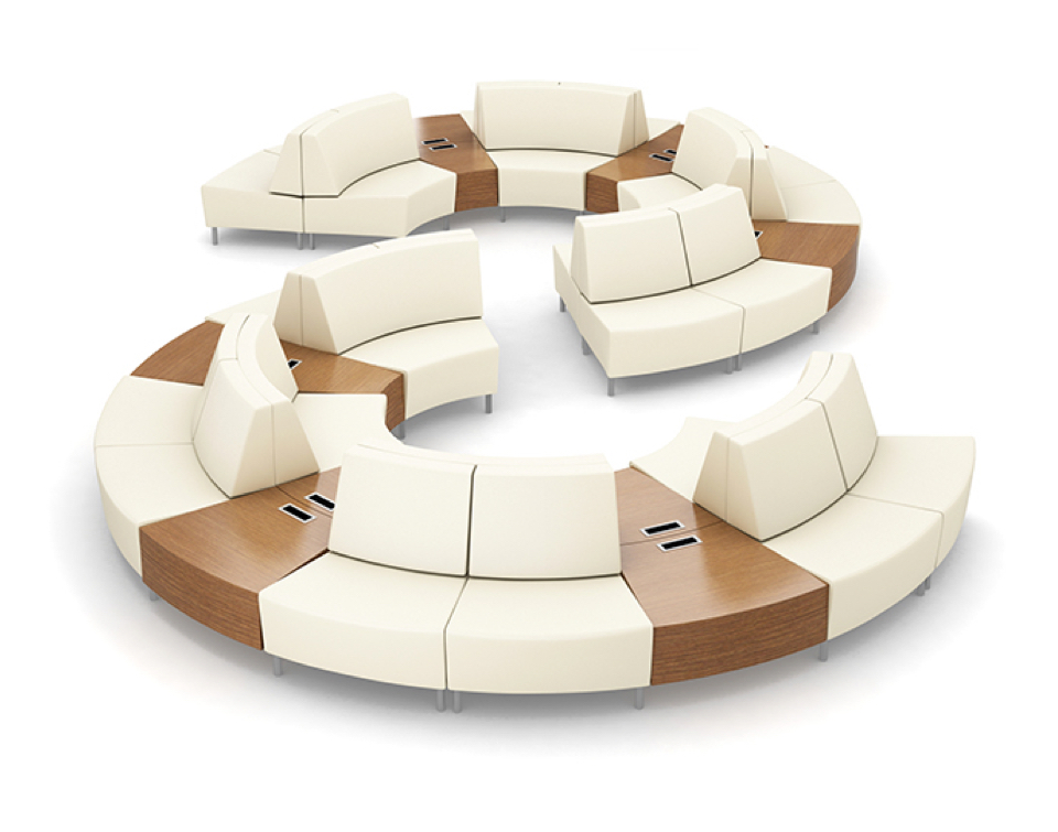 Large curved modular lounge configuration with occasional tables and built in power access