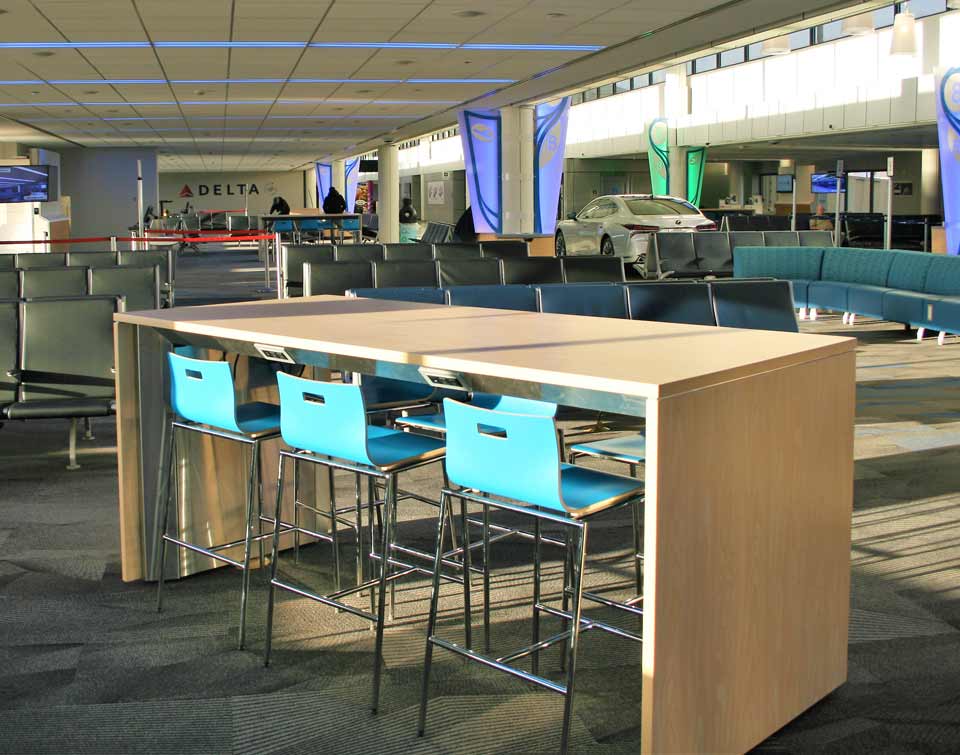 Communal charging table for Airport
