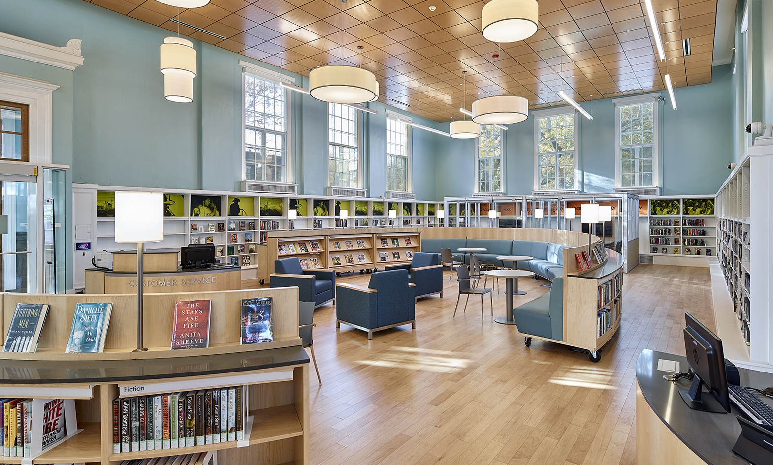 Library Furniture with curved library shelving and seating