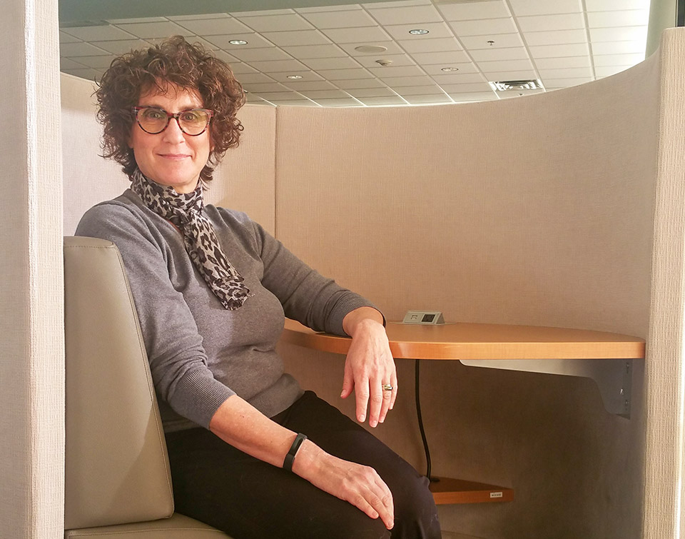 Librarian sitting in Study Pod Carrel