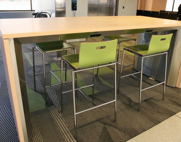 Modern Laminate stool with airport charging table in airport terminal
