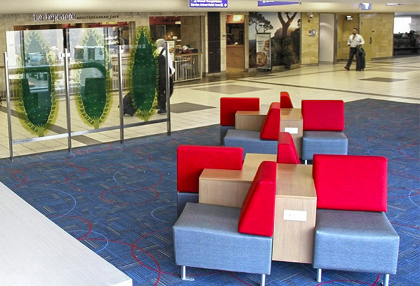 airport lounge seating with integrated charging tables and access to power