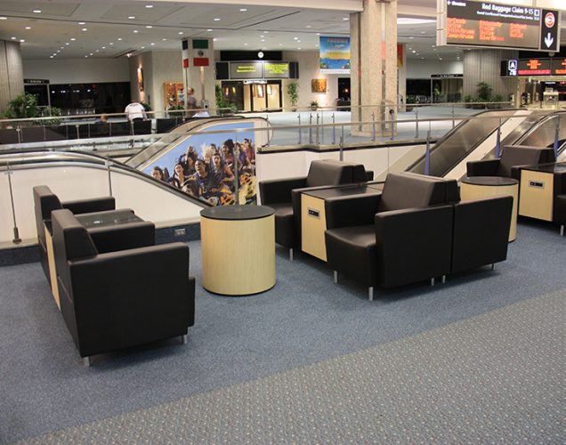 airport lounge seating with powered occasional tables