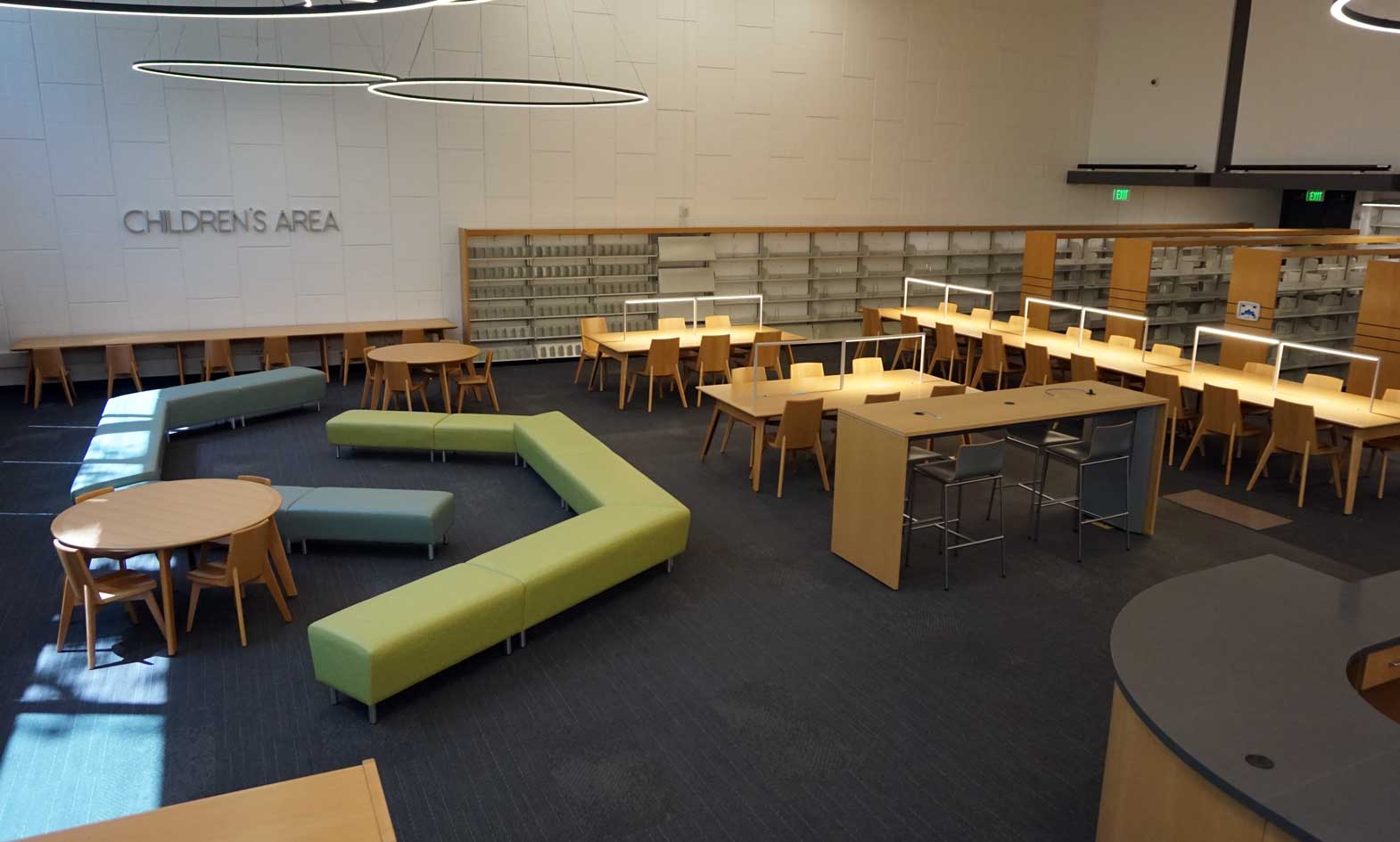 Children's library furniture with wood library tables, wood library chairs and upholstered benches