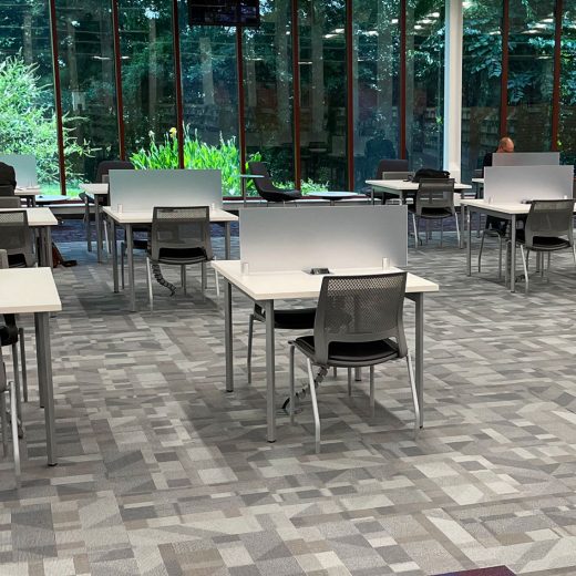 Modern library tables with frosted dividers and surface mount power