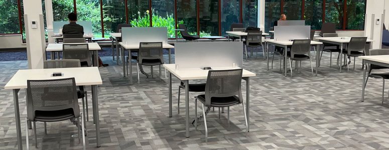 Modern library tables with frosted dividers and surface mount power