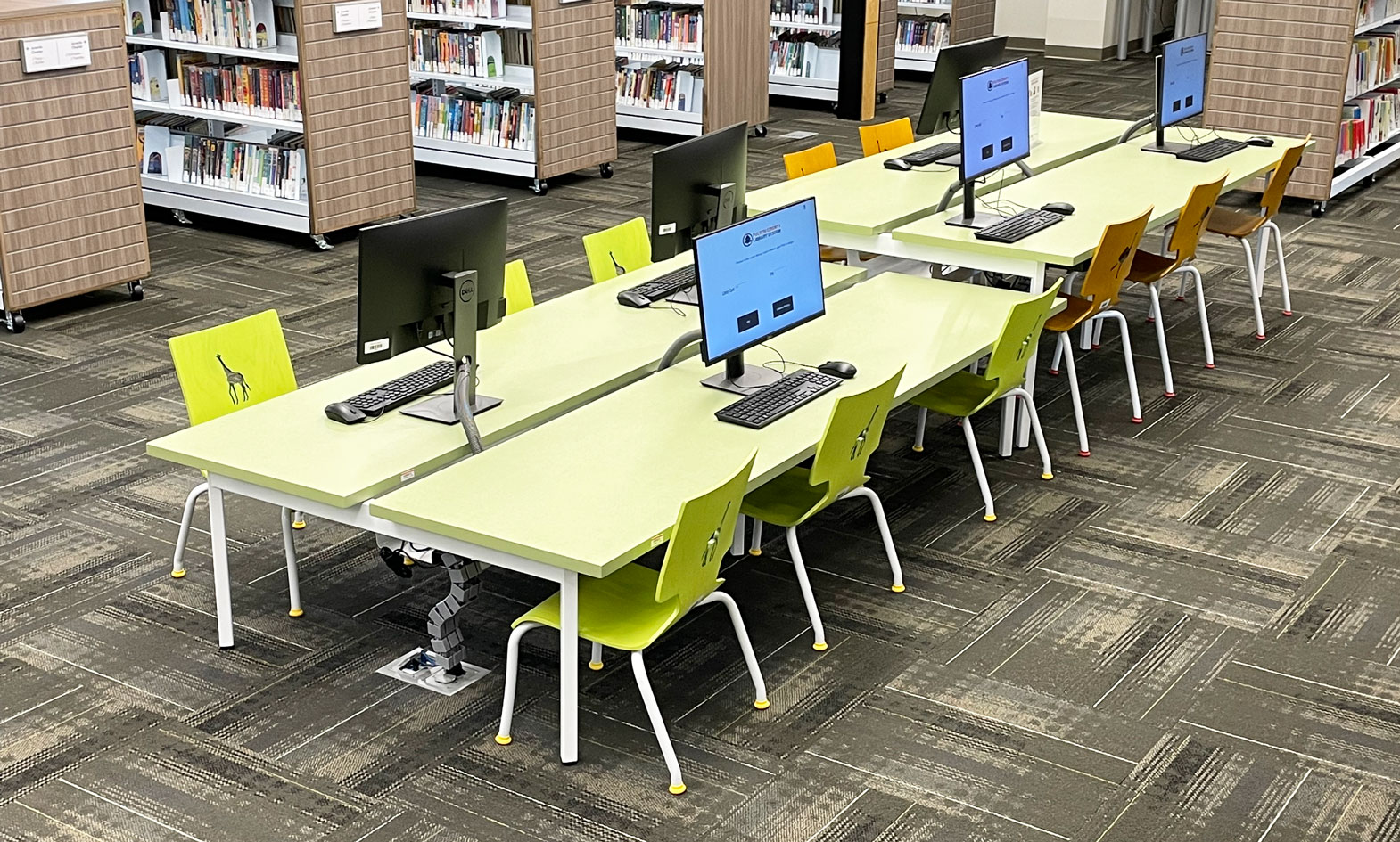 Large, dual height, children's computer table in public library