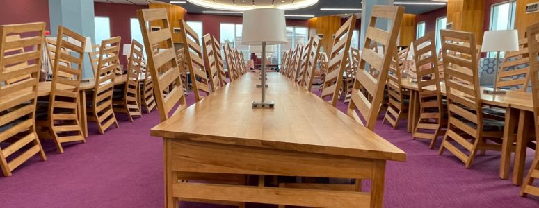custom library chairs and library tables with integrated lamps for University reading room