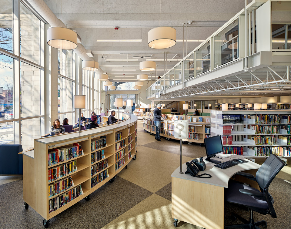 curved library shelving, library book displays and mobile library service desk