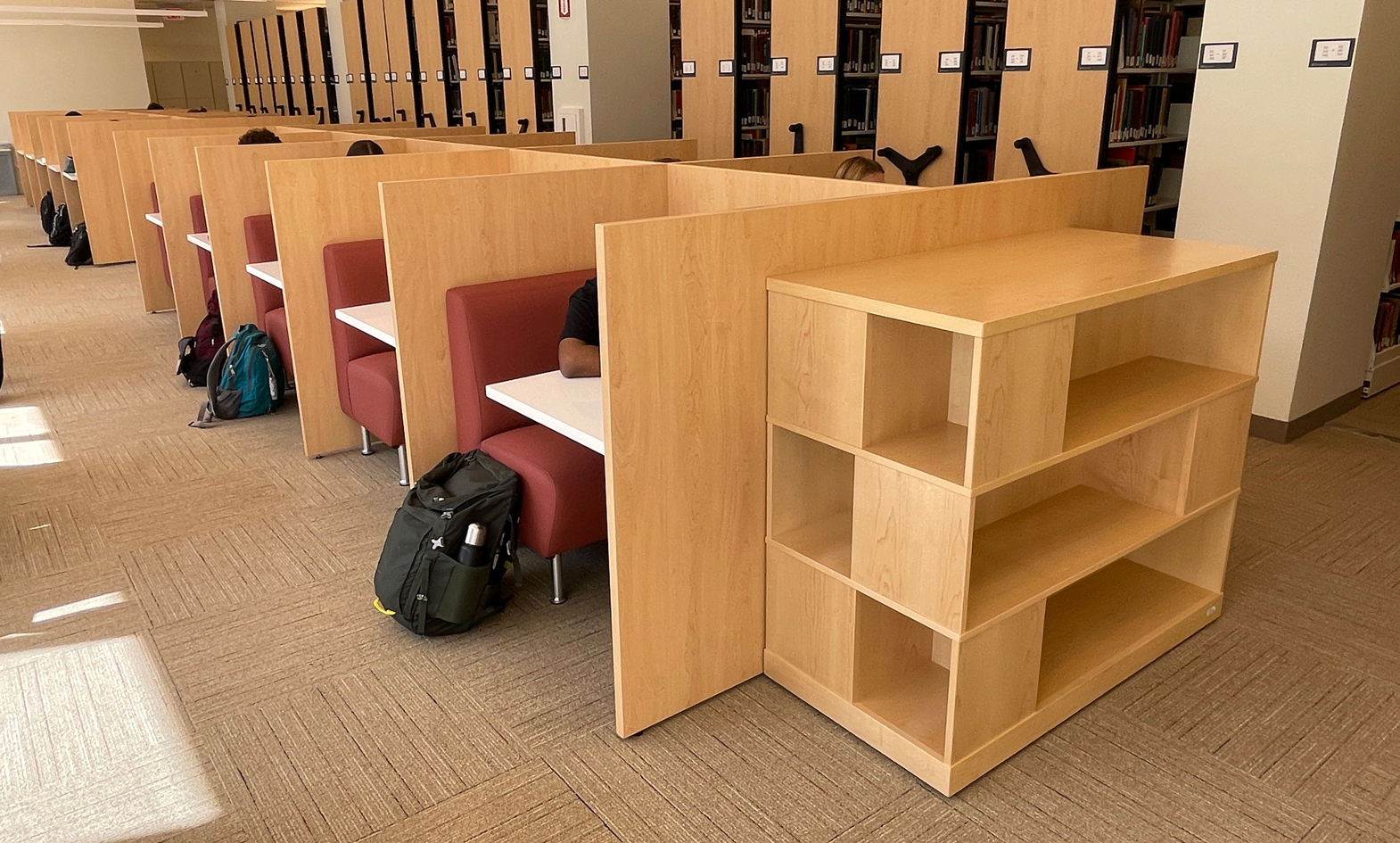 modern study carrels, with storage for backpacks and custom display shelving