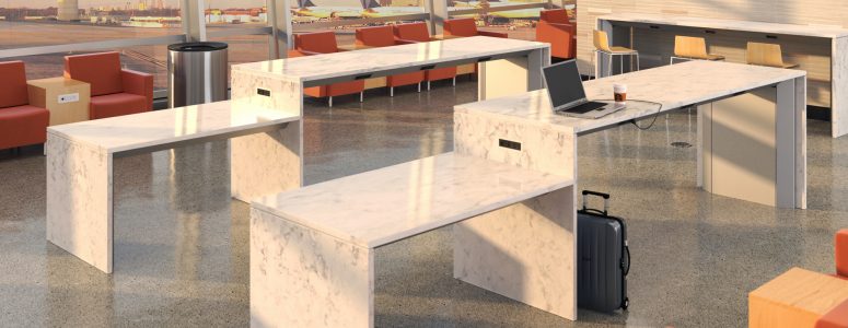 airport charging tables with white marble, ADA access and lounge seating in airport