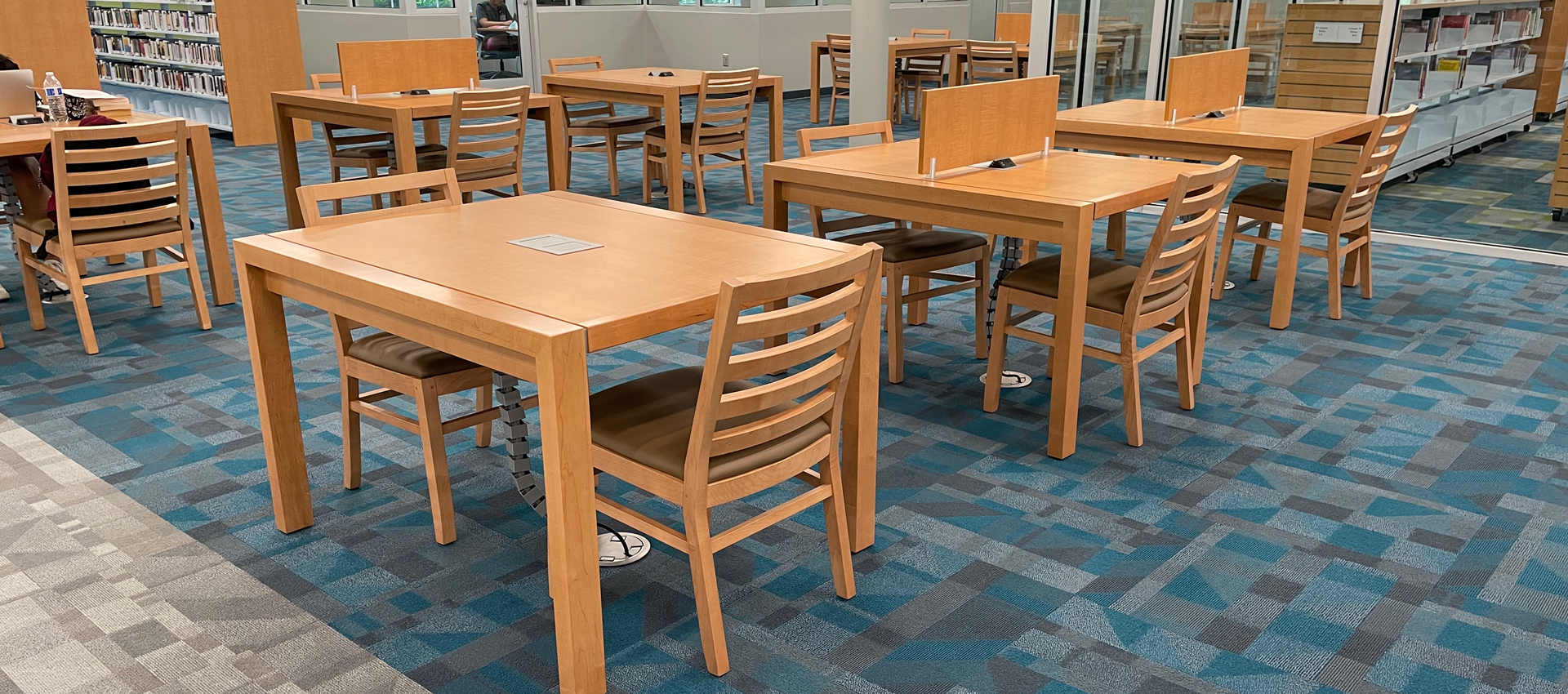 Contemporary wood study tables, with matching chairs for libraries
