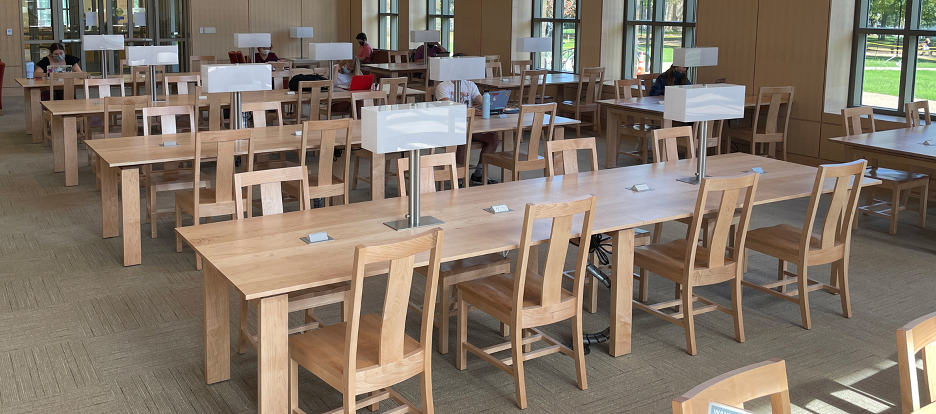 wood library chairs and study tables with access to power and integrated lighting, transitional wood style