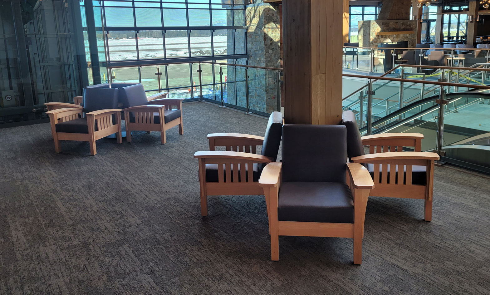 Lounge chairs with wood arms in airport