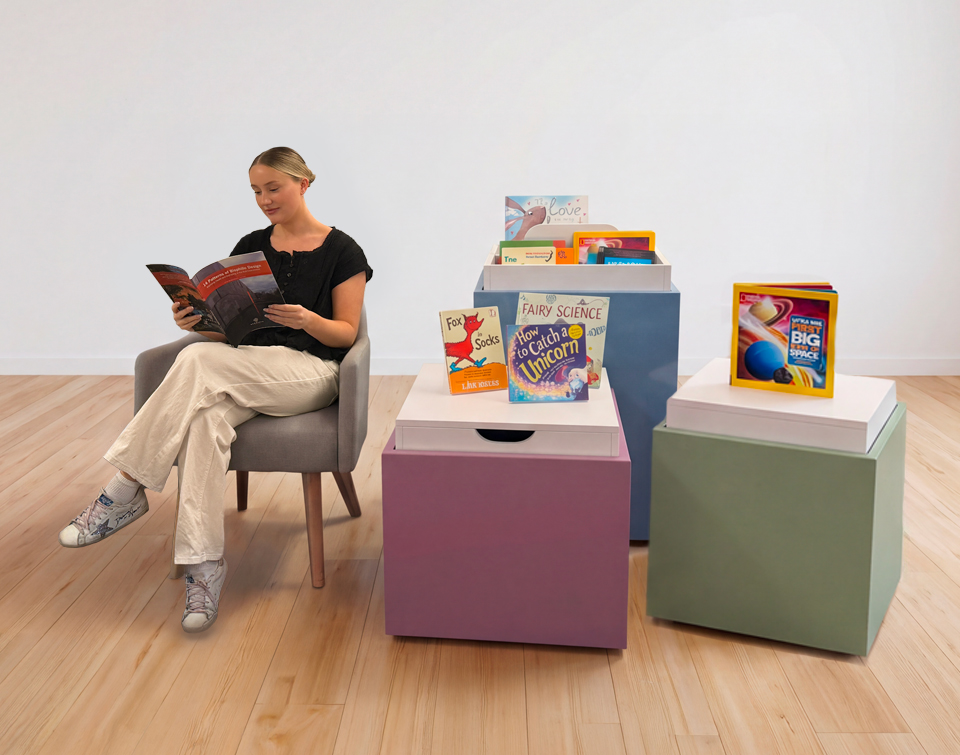 Cubit book storage and display being used by a reader. Perfect for libraries and stores for display.