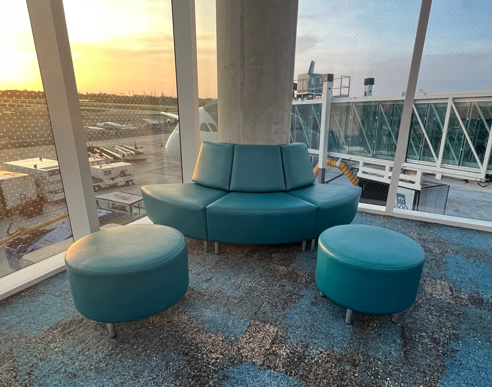 Comfortable Gee Curve Lounge seating wrapped around column at Key West Airport