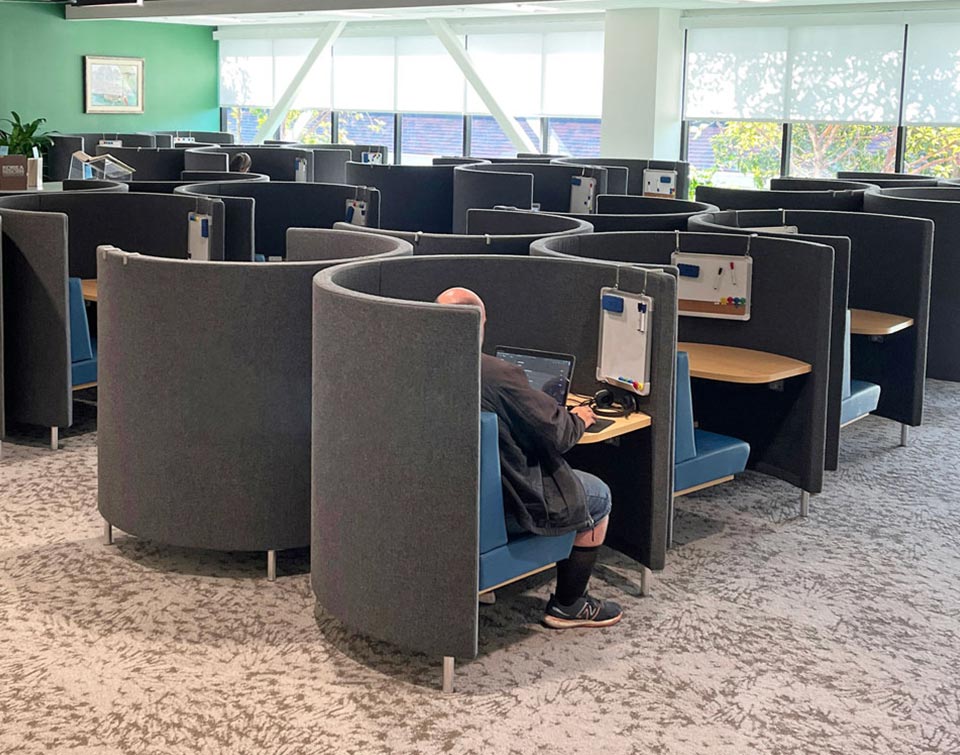 Large group of AGATI study pods with whiteboards in the MiraCosta College library supporting collaborative study