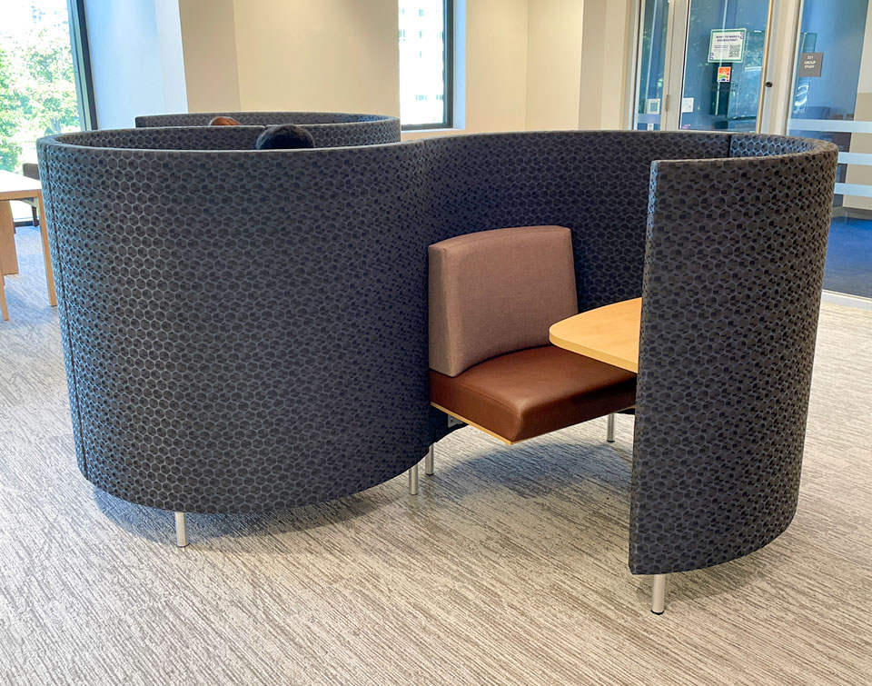 POD study carrels in serpentine arrangement, close up photo revealing details of fabric, seat and table